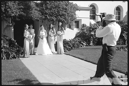 The Bride & Bridesmaids Pose infront of the Door