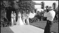 The Bride & Bridesmaids Pose infront of the Door