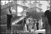 The Bridesmaids Watch the Bride on the Stair Top
