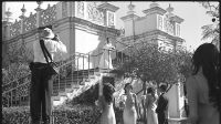 The Bridesmaids Watch the Bride on the Stair Top
